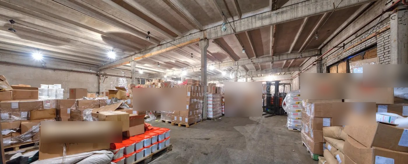 A real backroom captured by an in-store camera — what Anvista scores every morning.